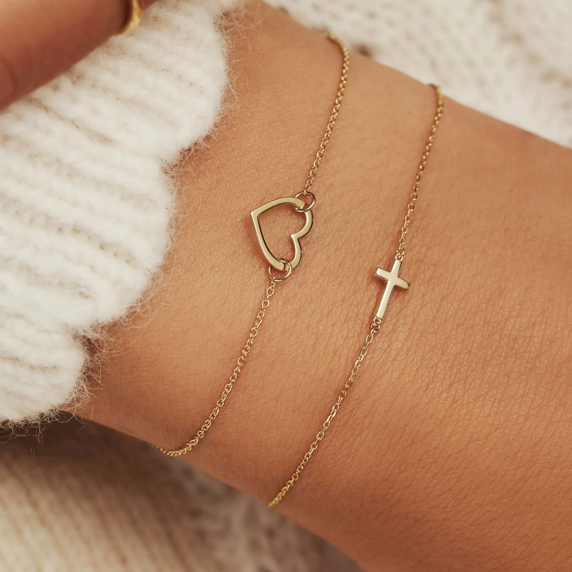 Monceau Solange 14 karaat gouden armband met kruisje